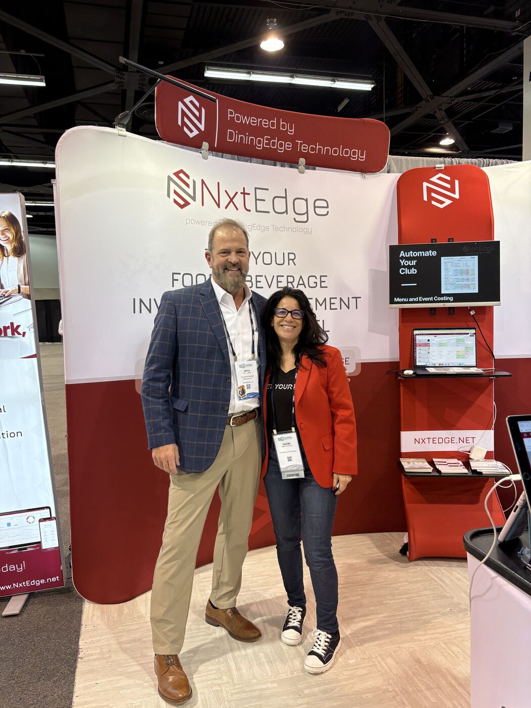 NxtEdge team members at the NxtEdge booth during CMAA