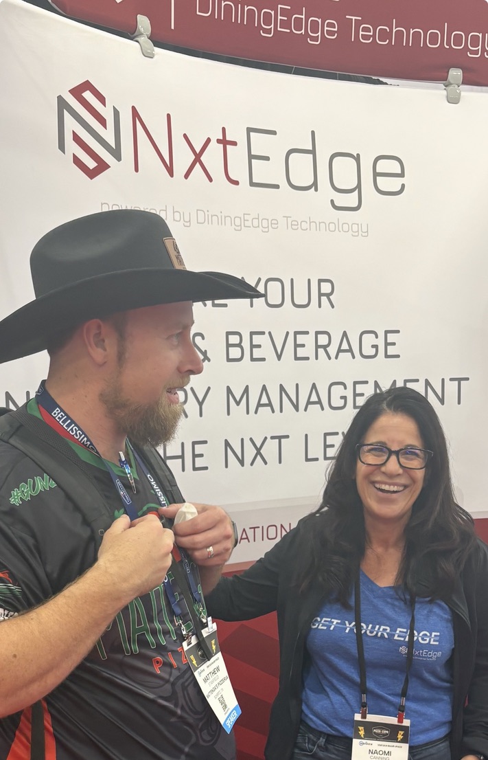 NxtEdge meeting a pizza competition champion at the International Pizza Expo