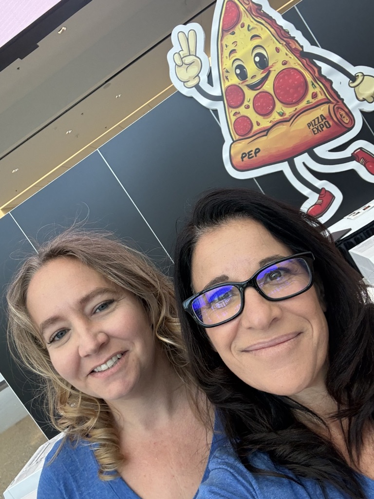 NxtEdge team with the Pizza Expo mascot in Las Vegas